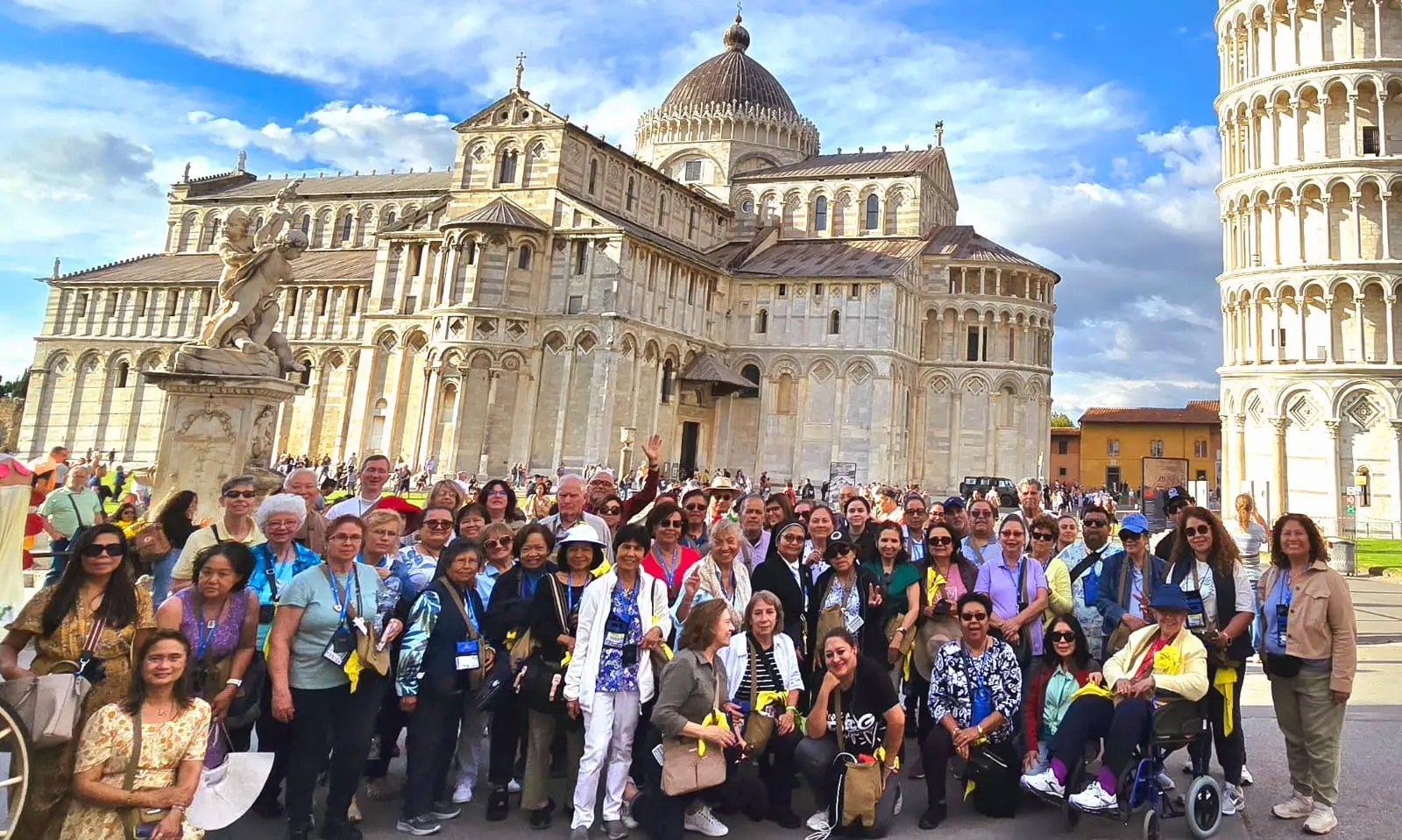 A group of people standing in front of a building.